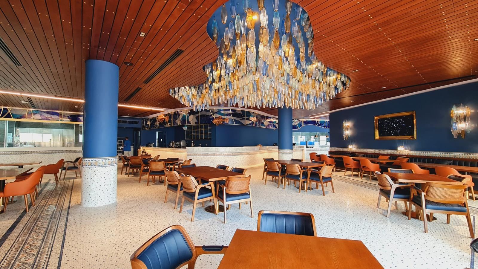 L'wzaar Sea Food Market dining room with fish chandelier